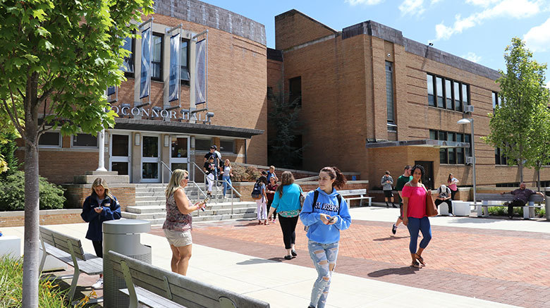 Students walking outside of O'Connor Hall.