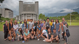 SJC students and faculty in front of Tzu Chi University's beautiful campus.