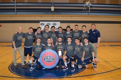Coach Kropp with the SJC Long Island men's volleyball team after they were named the 2018 Skyline Conference Champions.