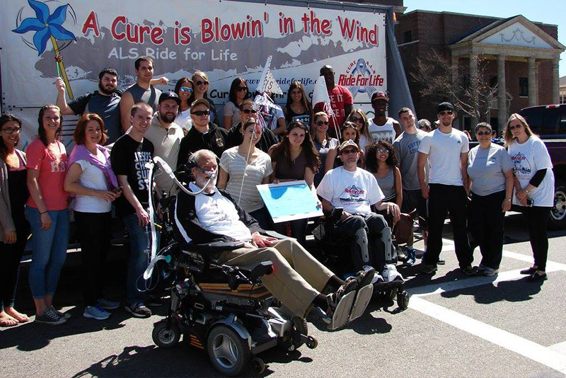 Pendergast with members of the SJC Long Island community during one of the Ride for Life events (ALS Awareness Mont).