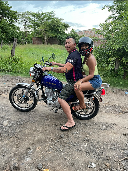 Myrka with her father in El Salvador.
