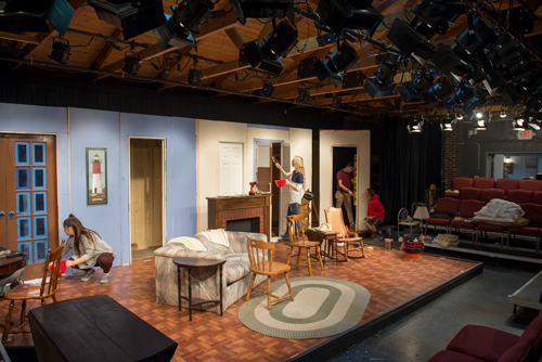 Students working on a set in the Playhouse in 2017.